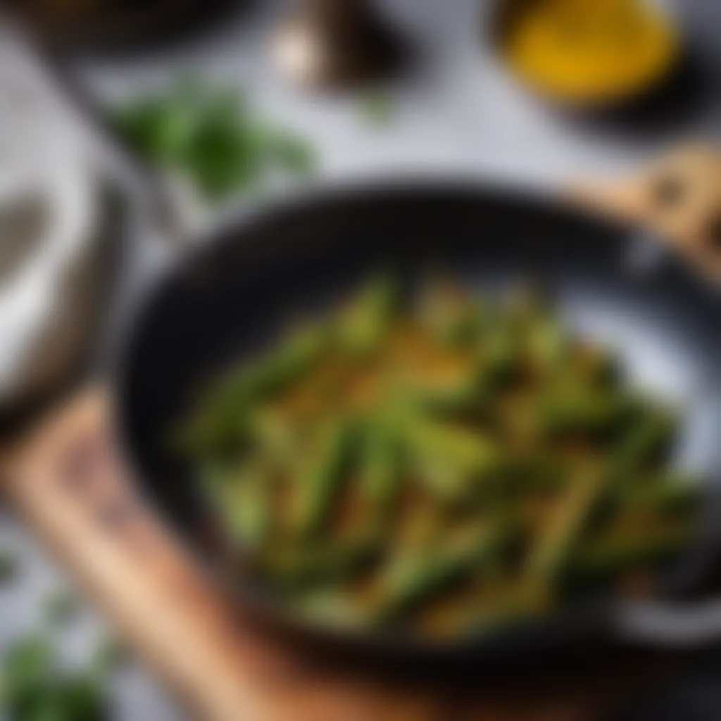 Cooking bhindi in a frying pan