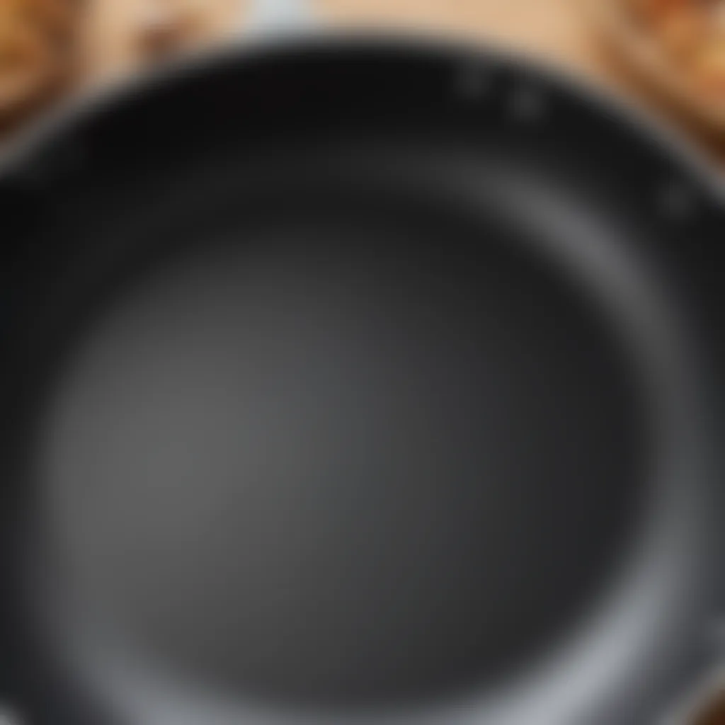 Detailed view of the non-stick surface of Calphalon Elite Fry Pan, emphasizing easy food release.