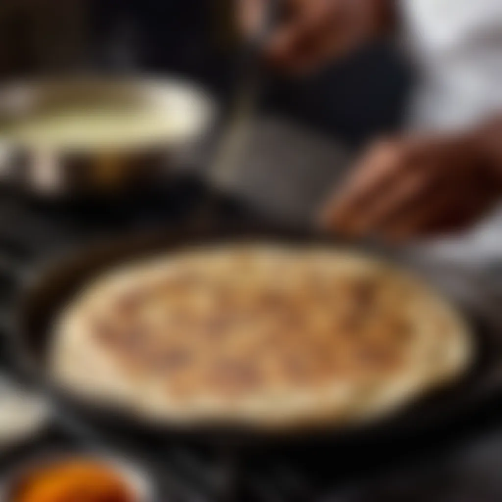 Cooking Akki Roti on Tawa Cooking Akki Roti on Tawa