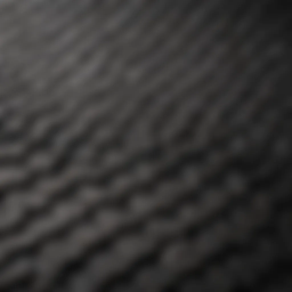 Close-up of textured black stick-on backsplash detailing