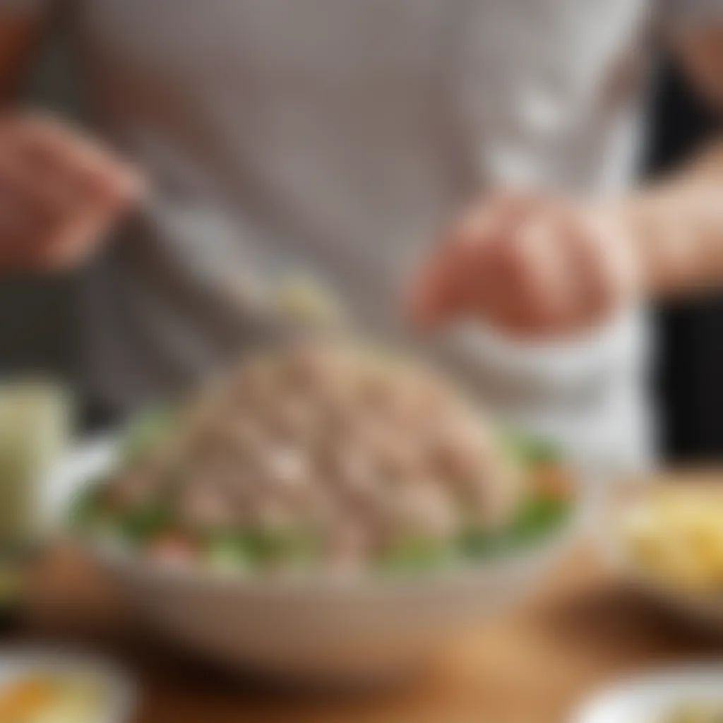 A health-conscious individual enjoying a bowl of tuna salad