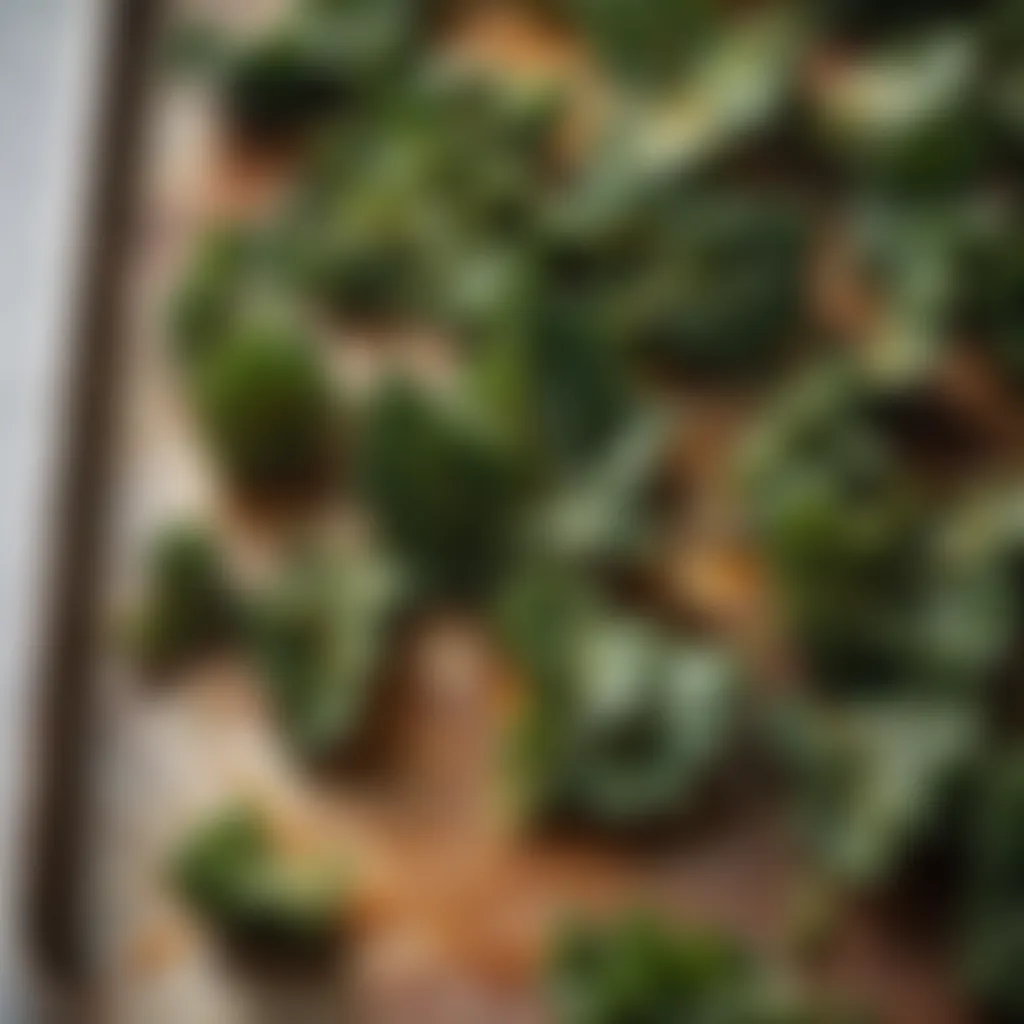 Crispy Kale Chips Golden roasted kale chips on a baking tray