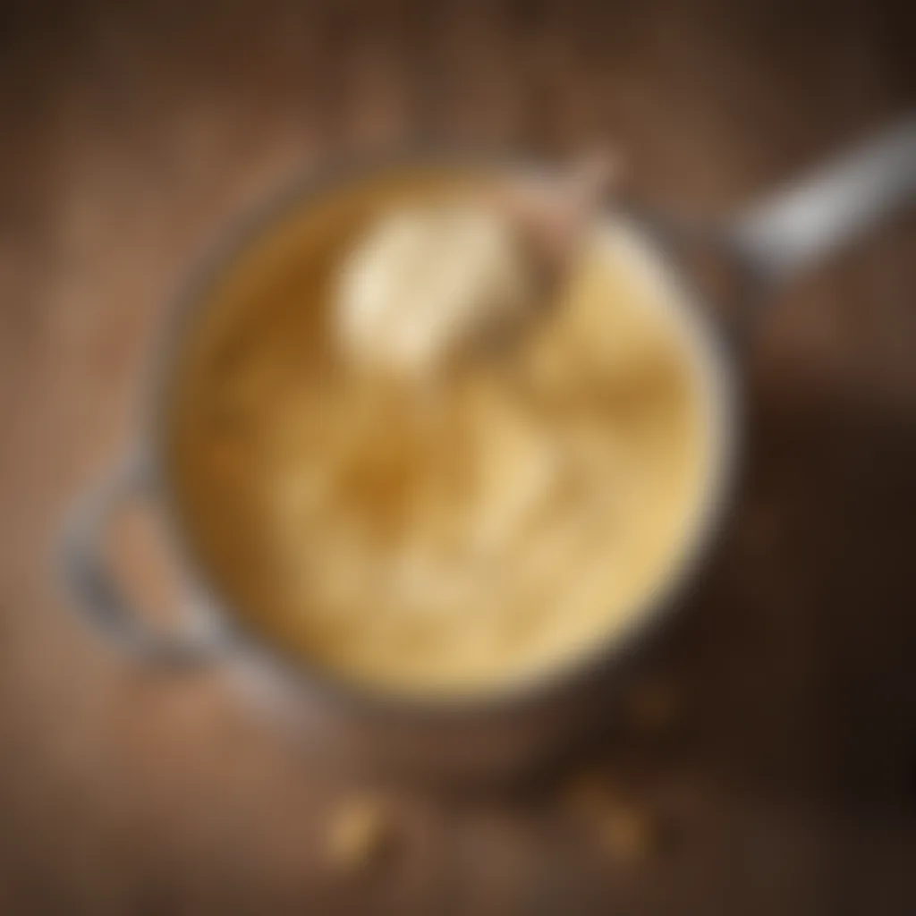 Close-up of creamy cheese sauce in a pot