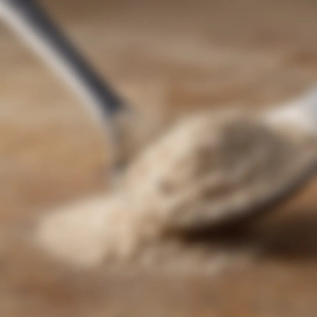 Close-up of xanthan gum powder with measuring spoons