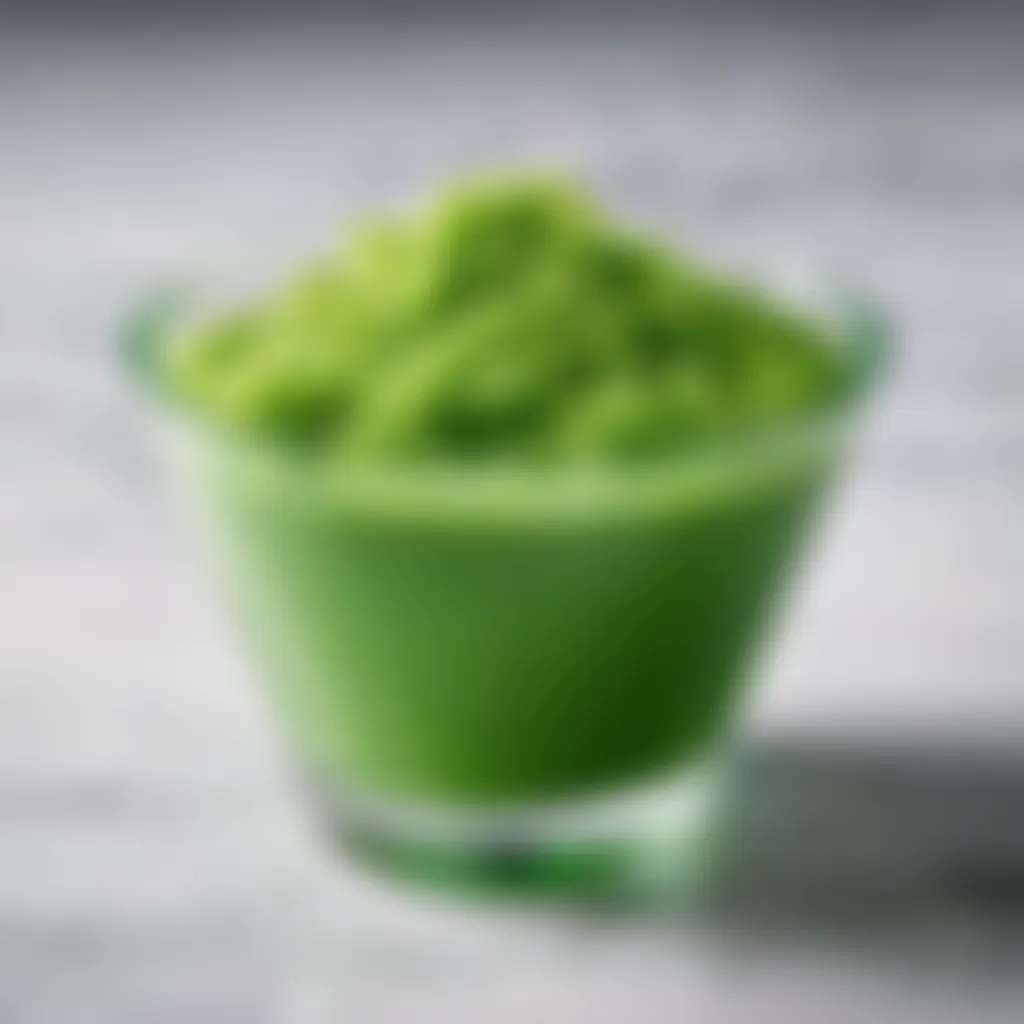 Blended Uggu mixture in a vibrant green color in a glass bowl