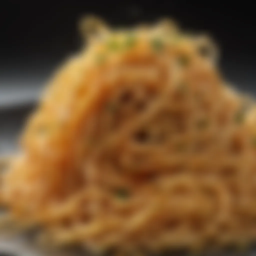 Close-up of al dente spaghetti coated in flavorful oil